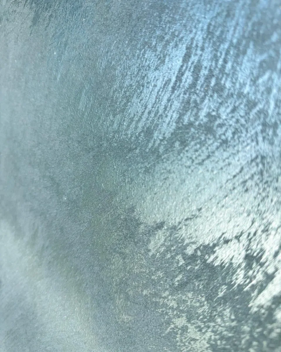 Wand mit Effektlasur in Blau und Türkis